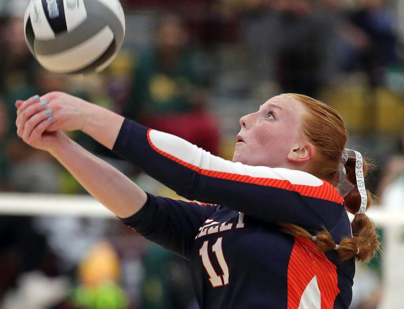 Ellet’s Riley Kearns gets under the ball during the second set of the City Series volleyball championship, Oct. 9, 2025, in Akron, Ohio.