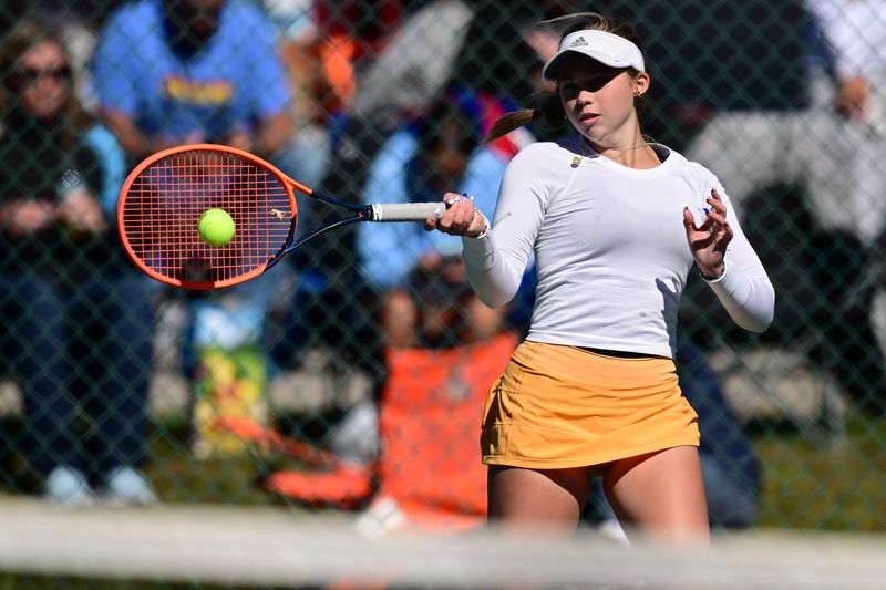 Hoover's Addison Sheil hits a forehand during a singles match at the Division I district tournament Oct. 9, 2025, at Springside Athletic Club in Akron.