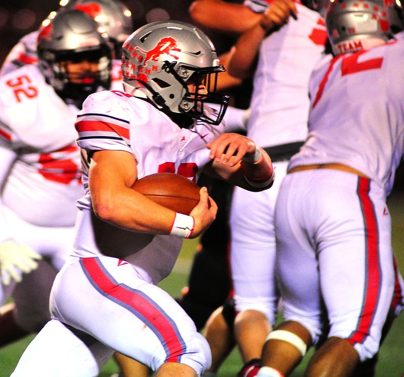 Minerva's Timothy Kirkpatrick carries the ball against Marlington, Friday, Oct. 10, 2025.