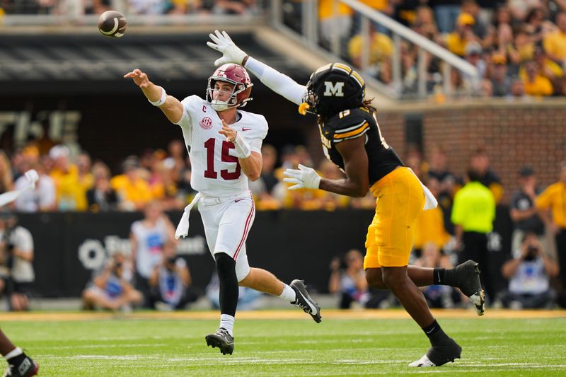 Oct 11, 2025; Columbia, Missouri, USA; Alabama Crimson Tide quarterback Ty Simpson (15) throws against Alabama Crimson Tide defensive back Chuck McDonald III (19) during the second half of the game at Faurot Field at Memorial Stadium. Mandatory Credit: Jay Biggerstaff-Imagn Images