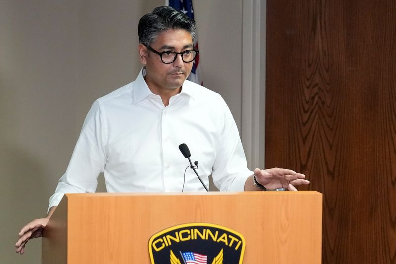 Cincinnati Mayor Aftab Pureval and Cincinnati Police Chief Teresa Theetge give an update on a Monday evening shooting on Fountain Square from the crime Investigation building in Cincinnati on Tuesday, Oct. 14, 2025.