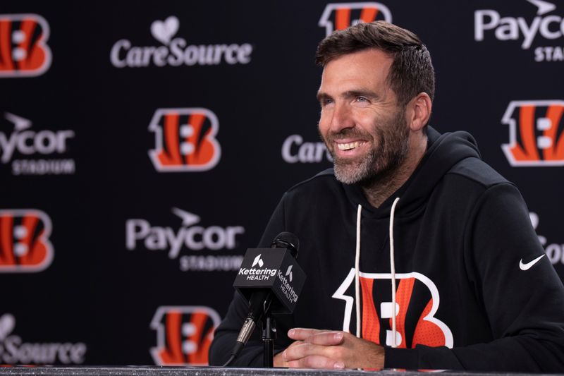 Bengals quarterback Joe Flacco smiles during a press conference at Paycor Stadium in Cincinnati on Oct. 14, 2025.