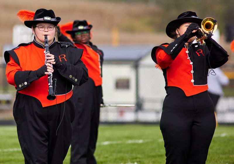 Seniors Emily Maple and Jillian Guthrie of the Ridgewood Marching Generals perform at a recent marching band competition.