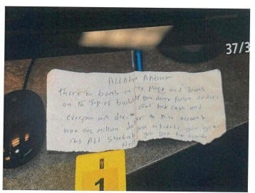 Federal court records show a note passed to a bank employee during an Oct. 8 robbery. The suspect, 31-year-old Rooble Adan, is being held in custody.