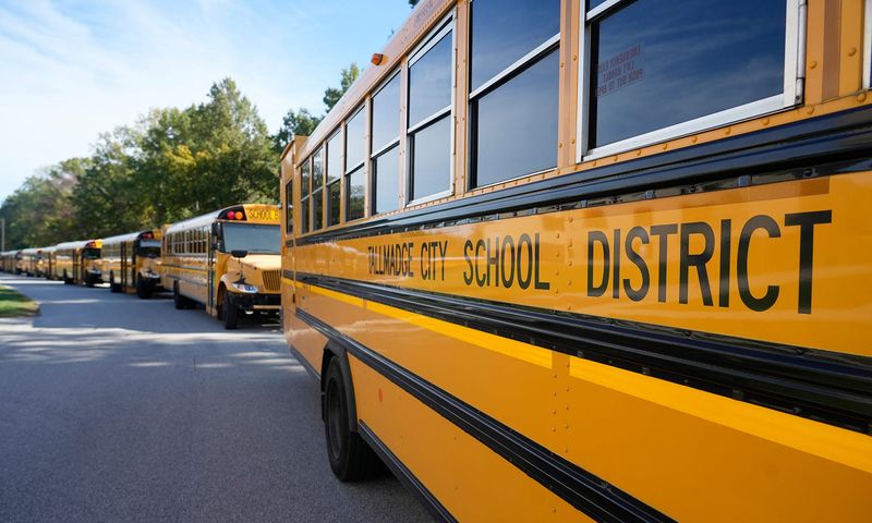 School buses line up behind Tallmadge Middle School at the end of the school day on Oct. 17, 2025.