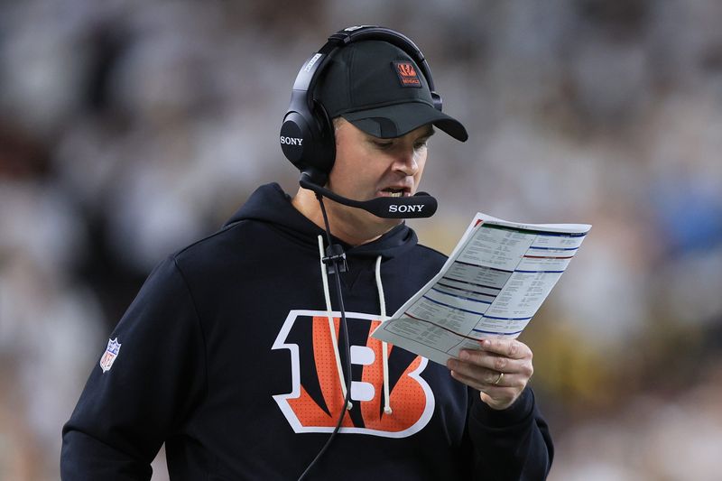 Oct 16, 2025; Cincinnati, Ohio, USA; Cincinnati Bengals head coach Zac Taylor calls a play against the Pittsburgh Steelers during the first half at Paycor Stadium. Mandatory Credit: Katie Stratman-Imagn Images
