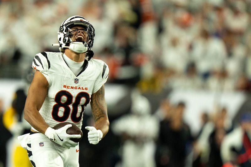 Cincinnati Bengals wide receiver Andrei Iosivas (80) reacts after a making a first down catch in the third quarter of the NFL game between the Cincinnati Bengals and Pittsburgh Steelers at Paycor Stadium in Cincinnati on Oct. 16, 2025.
