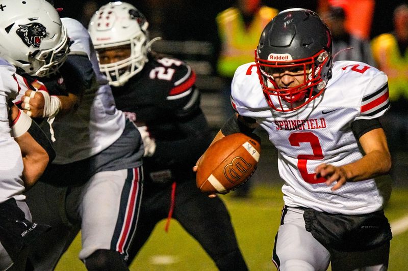 Springfield’s Anthony Berger (2) scrambles in a game against Norton, Oct. 17, 2025, at Norton High School in Norton, Ohio.