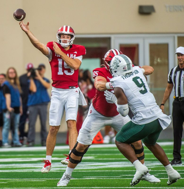 Indiana's Fernando Mendoza (15) passes during the Indiana versus Michigan State football game at Memorial Stadium on Saturday, Oct. 18, 2025.