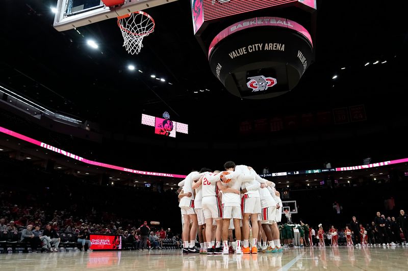 The Ohio State Buckeyes men's basketball team huddles prior to the NCAA preseason exhibition game against the Ohio Bobcats at Value City Arena in Columbus on Oct. 26, 2025. Ohio State won 103-74.