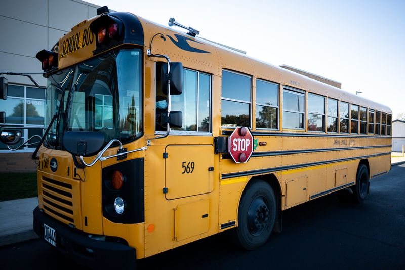An Akron Public Schools school bus is seen parked at Ellet Community Learning Center, Oct 27, 2025, in Akron, Ohio.