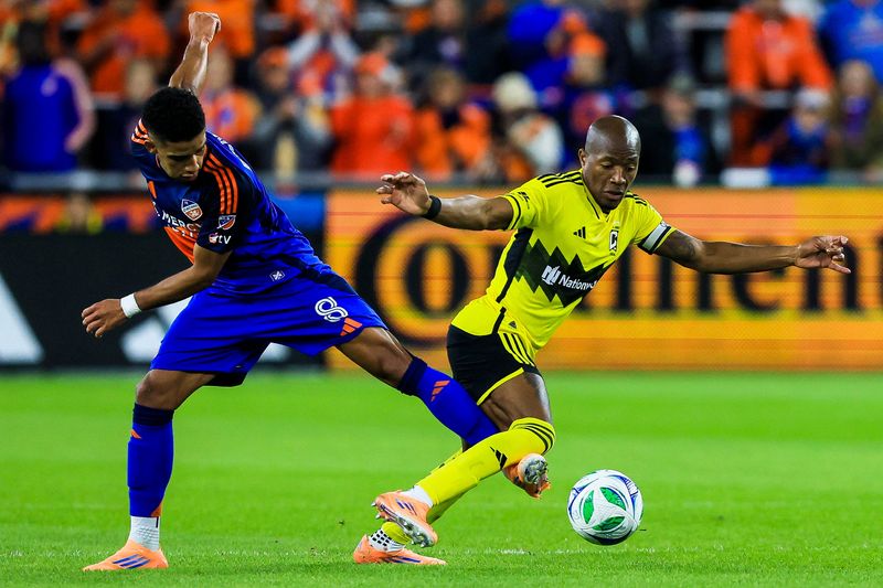 FC Cincinnati forward Brenner (8) and Columbus Crew midfielder Darlington Nagbe (6), shown battling for the ball on Oct. 27,  will be going toe-to-toe again Nov. 8 with the series on the line.
