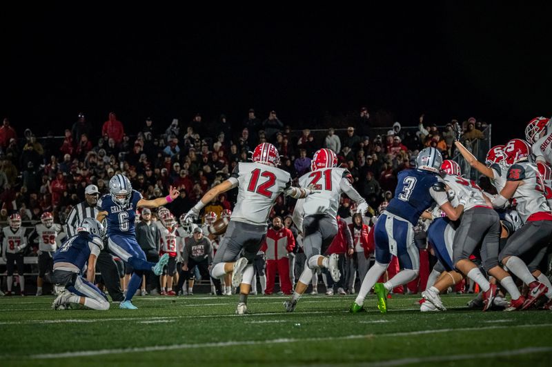 Granville's Bode Shoaps kicks the game-winning 35-yard field goal during the host Blue Aces' 30-28 victory against Sheridan in a Division III, Region 11 first-round game at Walter J. Hodges Stadium on Oct. 31, 2025.