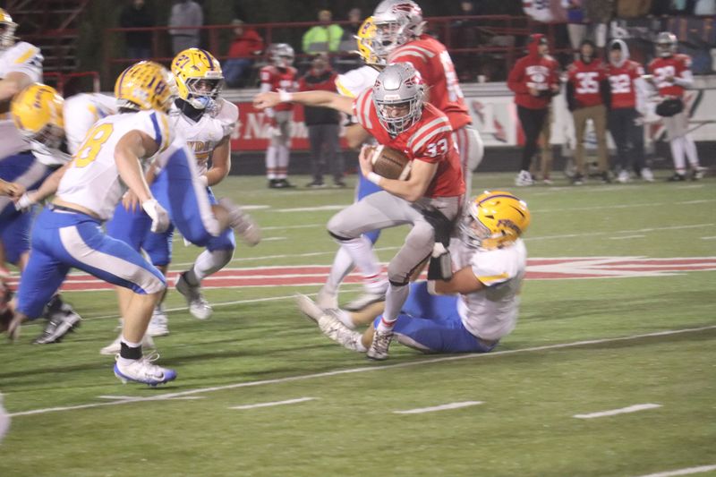 Bellevue's Nolan Hartman runs with the ball.