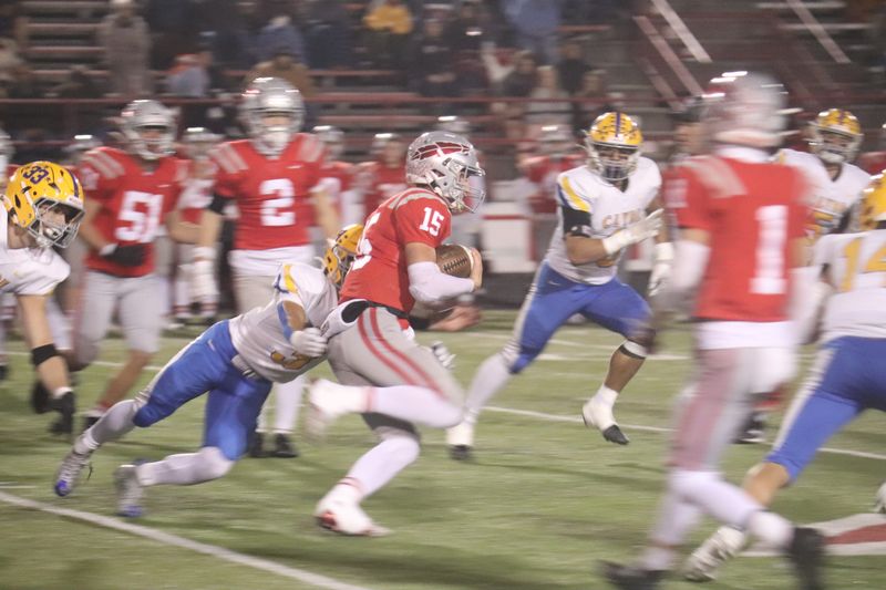 Bellevue's Ike Brown carries the ball.