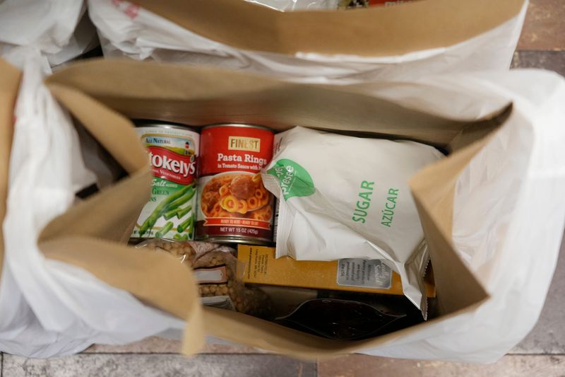 A bag of canned and dry food is packed and ready to be distributed at the Food & Clothing Pantry by St. Vincent de Paul John Hilkert Ozanam Center in Akron on Nov. 1, 2025.