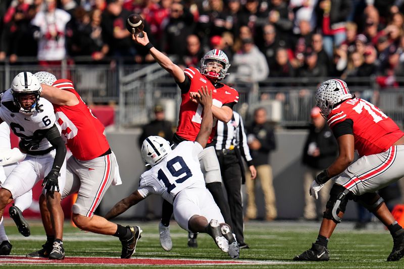 Ohio State Buckeyes quarterback Julian Sayin (10) throws a long touchdown pass to Carnell Tate during the NCAA football game against the Penn State Nittany Lions at Ohio Stadium in Columbus on Nov. 1, 2025.