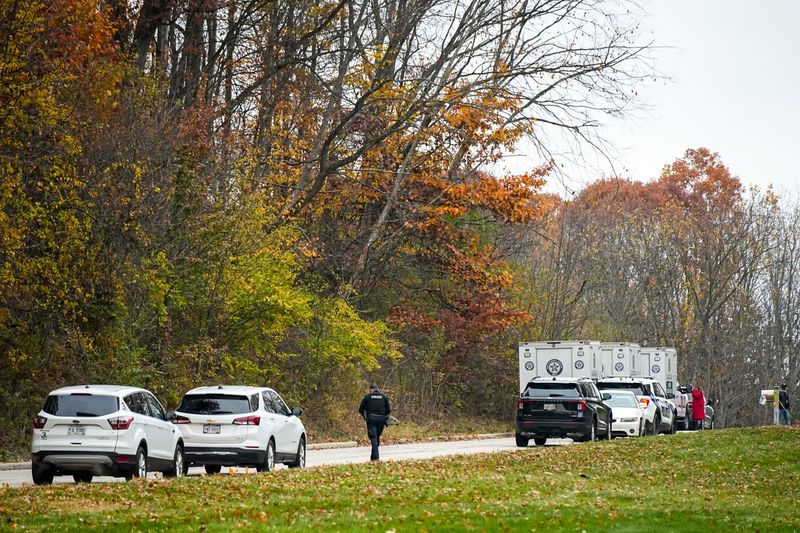 Ohio BCI officers along with Bath Police officers work the scene of a shooting at 933 Top-O-Hill Drive, Nov. 2, 2025, in Bath TWP, Ohio.