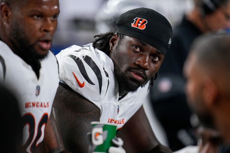 Cincinnati Bengals defensive end Shemar Stewart (97) sits between drives in the first quarter of the NFL Week 7 game between the Cincinnati Bengals and the Pittsburgh Steelers at Paycor Stadium in downtown Cincinnati on Thursday, Oct. 16, 2025.