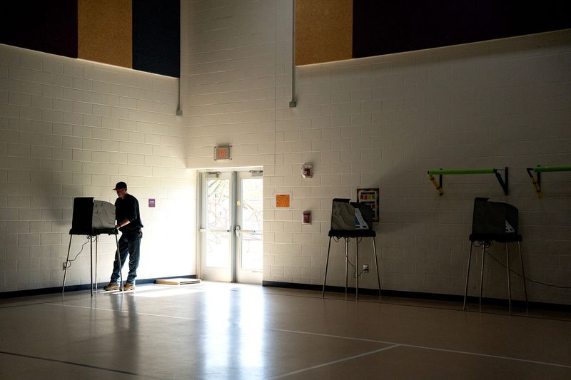 A man casts his ballot at Carson Elementary in Newark, Ohio, Nov 4, 2025.
