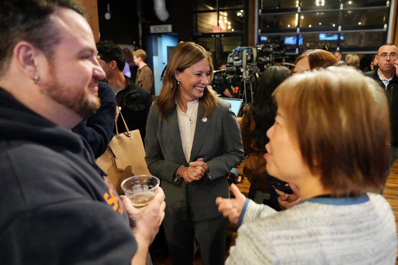 Democratic gubernatorial candidate Amy Acton, center, attends the Democratic candidates’ Election Night gathering at OTR Stillhouse in Cincinnati on Tuesday, November 4, 2025.