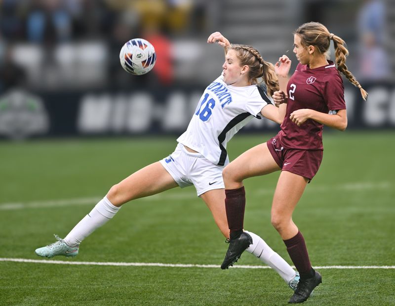 Cincinnati Summit Country Day's Emma Gibson and Columbus Academy's Lexi Forchione battle Nov. 7 in the Division IV state championship game at Historic Crew Stadium. Academy lost 4-0.