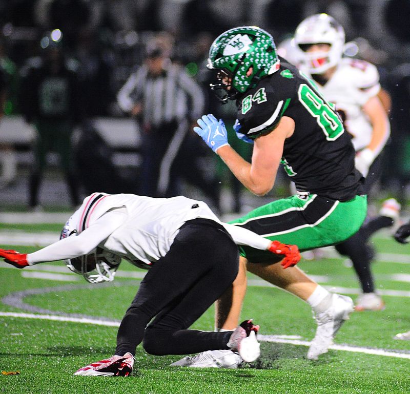 West Branch's Gavin Gregory advances the ball after a reception in a OHSAA Division IV playoff game against Norton Friday November 7, 2025.