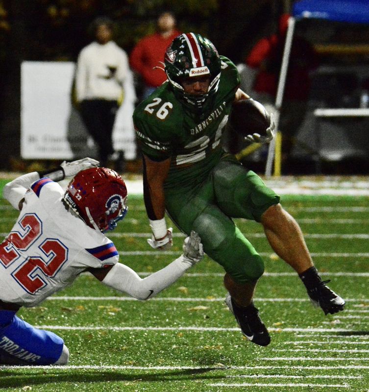 Barnesville sophomore Trey Toliver (26) picks up yardage during the Shamrocks 34-0 victory over Portsmouth in OHSAA Division V, Region 19 action at Shamrock Stadium on Friday, November 7th, 2025. Toliver finished with 3 rushing touchdowns in the 'Rocks victory.