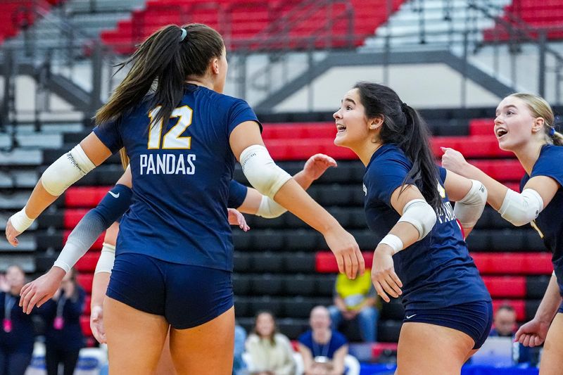 Notre Dame’s Lizzy Larkins, center, celebrates with her teammates during the KHSAA girls volleyball state championship game against Assumption on Nov 8, 2025.