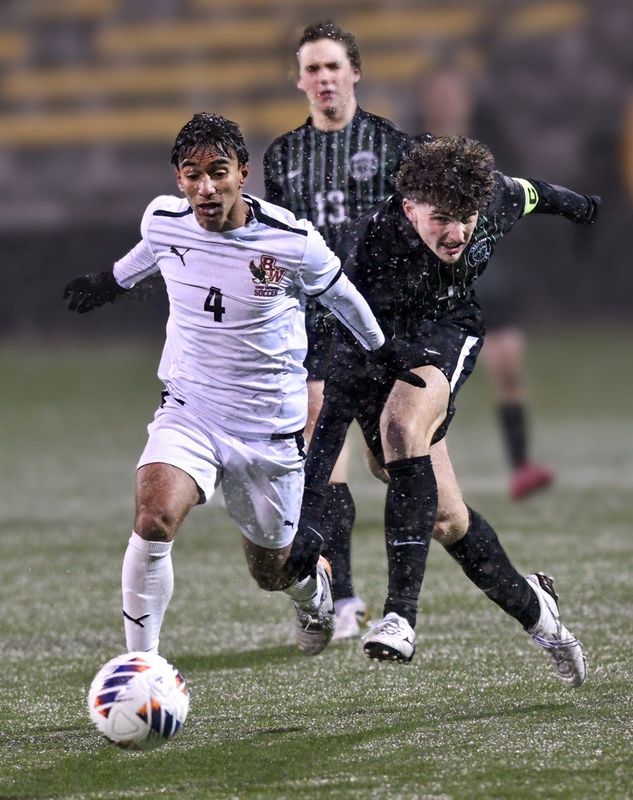 Watterson's Alex Das gets by Aurora's Griffin McMaster on Nov. 9, 2025, at Historic Crew Stadium. (photo by John Hulkenberg)