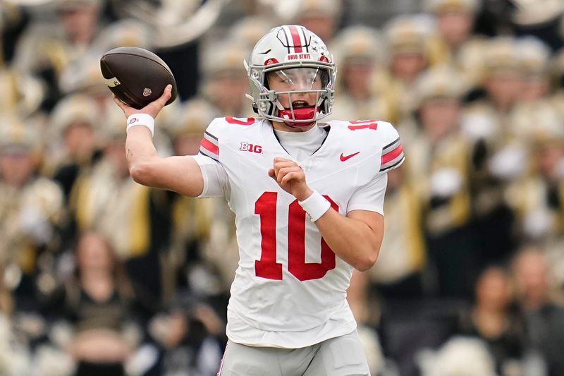 Ohio State Buckeyes quarterback Julian Sayin (10) throws during the NCAA football game against the Purdue Boilermakers at Ross-Ade Stadium in West Lafayette, Ind. on Nov. 8, 2025.