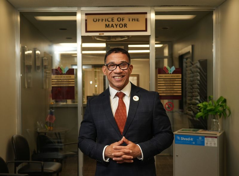 Whitehall mayor Michael T. Bivens stands outside his office Nov 12, 2025.