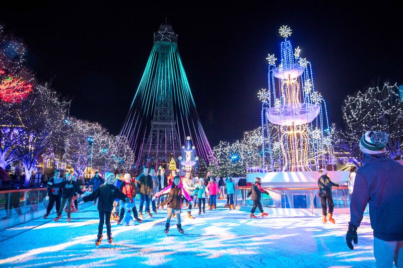The fountain at Kings Island becomes Snow Flake Lake during WinterFest, opening for ice skating.