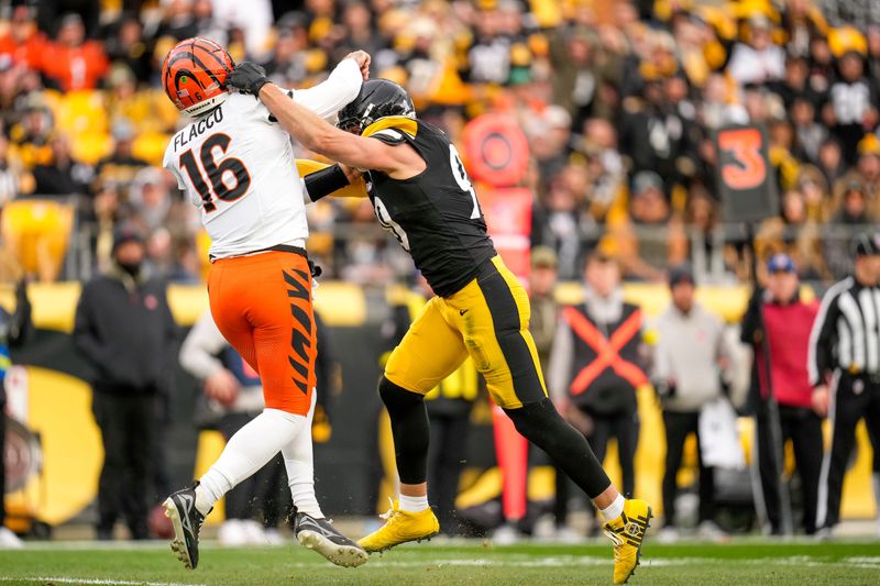 Pittsburgh Steelers linebacker T.J. Watt knocks down Cincinnati Bengals quarterback Joe Flacco in November 2025.