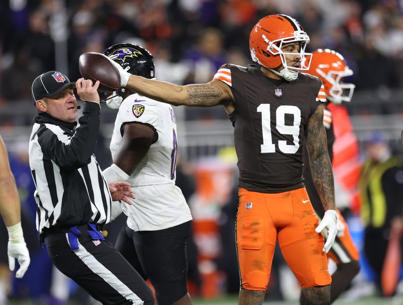 Nov 16, 2025; Cleveland, Ohio, USA; Cleveland Browns wide receiver Cedric Tillman (19) reacts after a run for a gain during the second quarter against the Baltimore Ravens at Huntington Bank Field. Mandatory Credit: Scott Galvin-Imagn Images