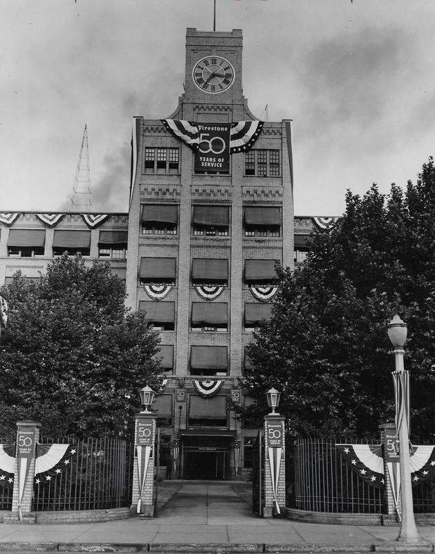 Patriotic banners and streamers decorate the main entrance of Firestone Tire & Rubber Co. in Akron as the company celebrates its 50th anniversary in 1950.