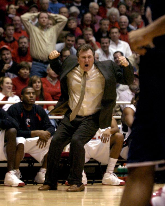 University of Cincinnati head coach Bob Huggins loses it in the second half against Xavier for the annual Skyline Chili Crosstown Shootout at Fifth Third Arena on Feb. 10, 2005.
