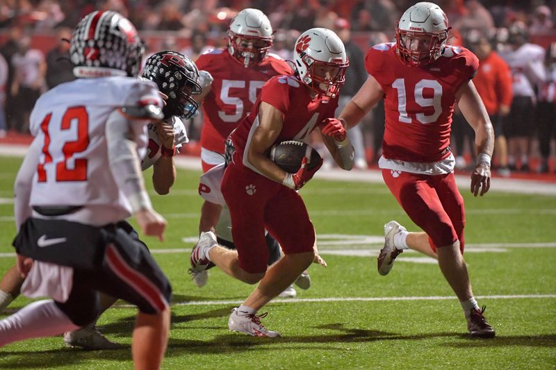 Beechwood wide receiver Tyler Fryman (4) runs the ball during the KHSAA Class 2A postseason game between Beechwood and Prestonsburg on Friday, Nov. 21, 2025.