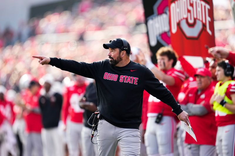 Ohio State Buckeyes head coach Ryan Day motions from the sideline during the first half of the NCAA football game against the Rutgers Scarlet Knights at Ohio Stadium in Columbus on Nov. 22, 2025.