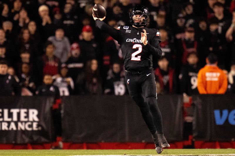 Cincinnati Bearcats quarterback Brendan Sorsby (2) throws an interception in the third quarter of the NCAA football game between the Cincinnati Bearcats and BYU Cougars at Nippert Stadium in Cincinnati on Nov. 22, 2025.