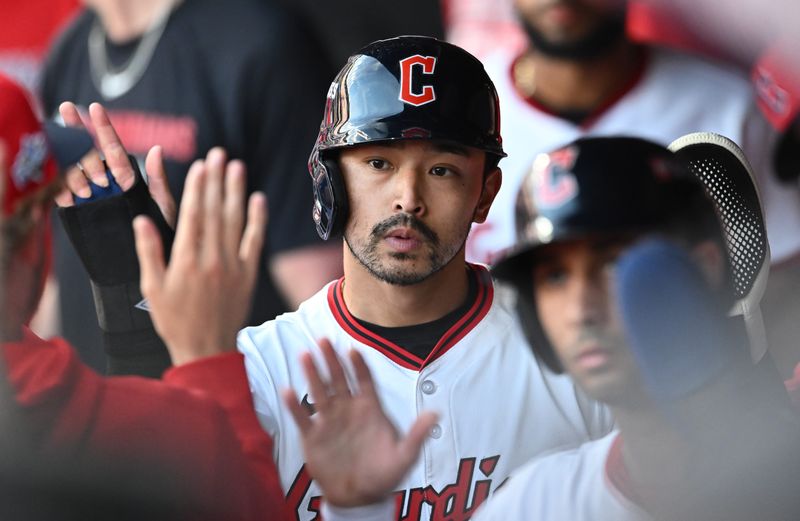 Cleveland Guardians outfielder Steven Kwan (38) celebrates with teammates after scoring in the eighth inning against the Detroit Tigers during game three of the Wildcard round for the 2025 MLB playoffs on Oct. 2, 2025, at Progressive Field.