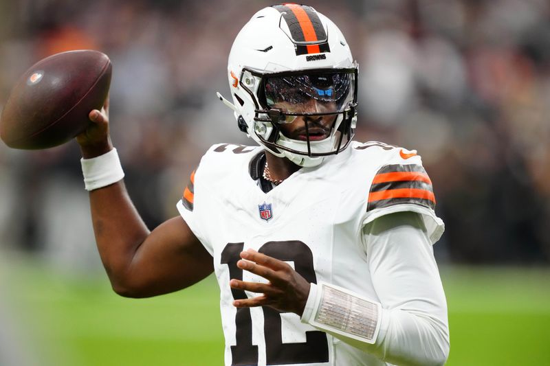 Nov 23, 2025; Paradise, Nevada, USA; Cleveland Browns quarterback Shedeur Sanders (12) throws the ball against the Las Vegas Raiders at Allegiant Stadium. Mandatory Credit: Kirby Lee-Imagn Images