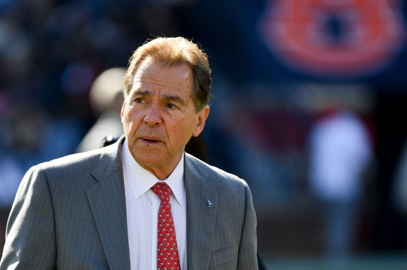 Nov 25, 2023; Auburn, Alabama, USA; Alabama Crimson Tide head coach Nick Saban walks through Jordan-Hare Stadium as he does his traditional pregame walk around the field before the game with the Auburn Tigers. Mandatory Credit: Gary Cosby Jr.-USA TODAY Sports