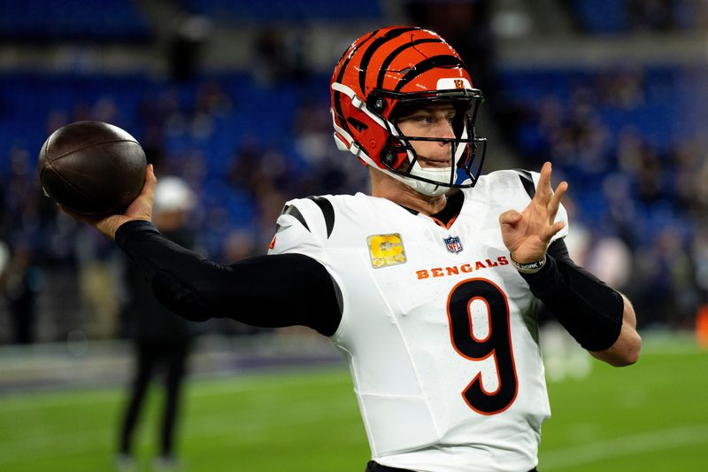 Cincinnati Bengals quarterback Joe Burrow (9) warms up before the NFL game between the Cincinnati Bengals and the Baltimore Ravens at M&T Banks Stadium in Baltimore on Thursday, Nov. 7, 2024.