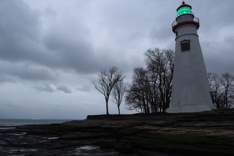 The Marblehead lighthouse is shown from about 50 feet into what would normally be Lake Erie waters. The water level was at least six feet low, thanks to a gale warning issued on Nov. 26 with nearshore nine-foot waves on Lake Erie combined with low water levels.