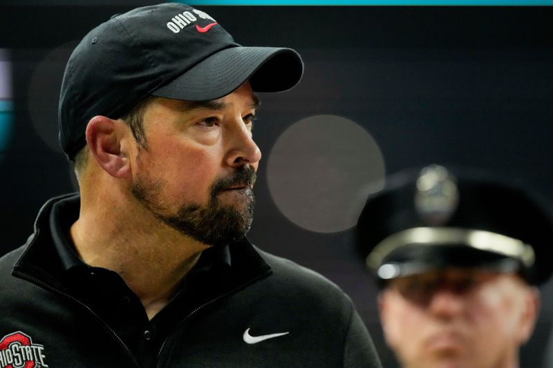 Ohio State Buckeyes head coach Ryan Day looks onto the field Saturday, Dec. 6, 2025, during the Big Ten football championship against the Indiana Hoosiers at Lucas Oil Stadium in Indianapolis.