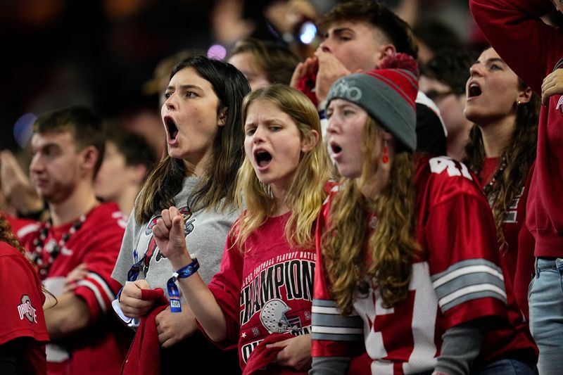 Ohio State Buckeyes fans object to a call during the Big Ten Conference championship game against the Indiana Hoosiers at Lucas Oil Stadium in Indianapolis on Dec. 6, 2025. Ohio State lost 13-10.