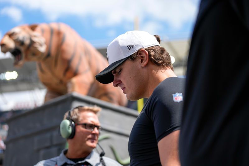 Cincinnati Bengals defensive end Trey Hendrickson (91) walks on the field for the first quarter of the NFL Preseason Week 3 game between the Cincinnati Bengals and the Indianapolis Colts at Paycor Stadium in Cincinnati on Saturday, Aug. 23, 2025. The Colts led 24-7 at halftime.