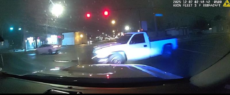 A screengrab from a Columbus police dash camera seconds before the cruiser collides with a pickup truck. The driver of the truck, Corey Tinnes, was pronounced dead at a local hospital.