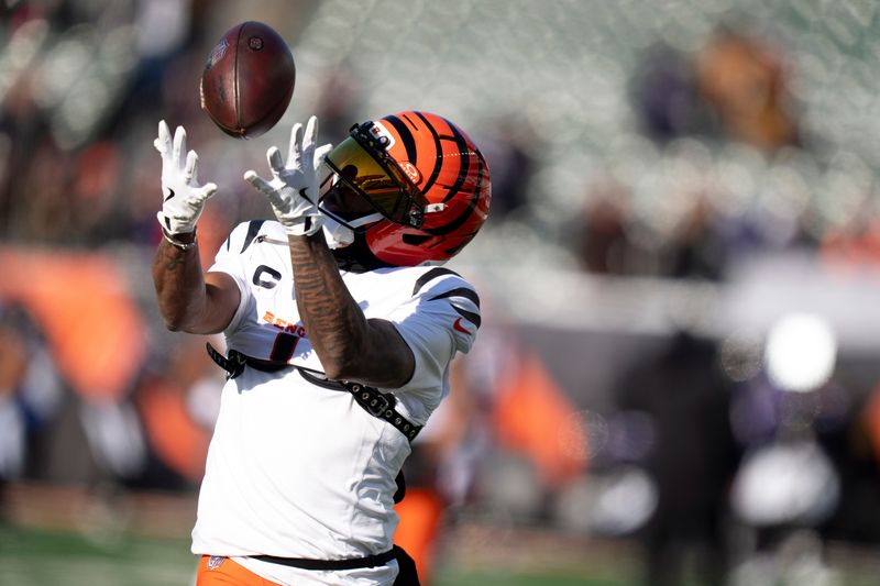 Cincinnati Bengals wide receiver Ja'Marr Chase (1) catches a pass before the NFL football game between Baltimore Ravens and Cincinnati Bengals at Paycor Stadium in Cincinnati on Dec. 14, 2025.